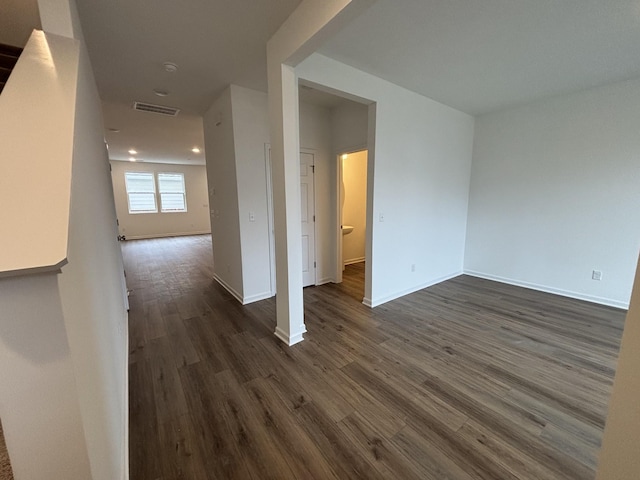 empty room featuring dark hardwood / wood-style floors