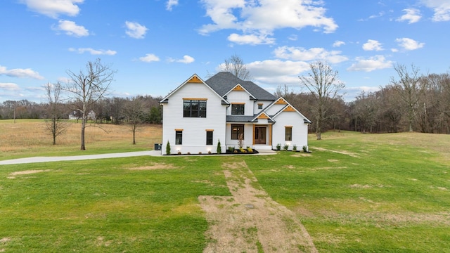 view of front of property with a front yard