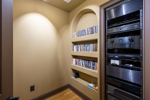 interior details featuring hardwood / wood-style floors