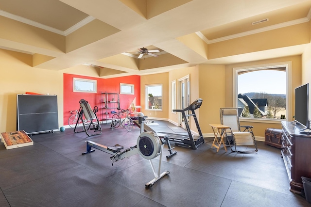 exercise room with crown molding and ceiling fan