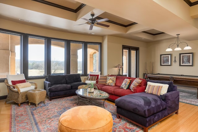 living room featuring pool table, ornamental molding, and hardwood / wood-style floors