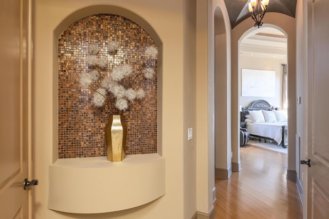 hall featuring wood-type flooring