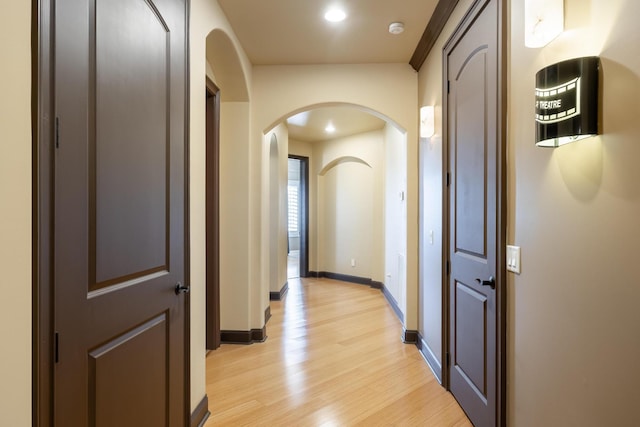 corridor featuring light wood-type flooring