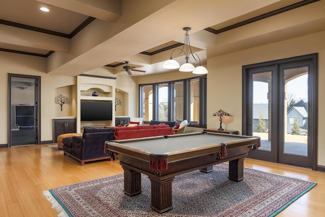 playroom featuring crown molding, billiards, french doors, beamed ceiling, and light wood-type flooring