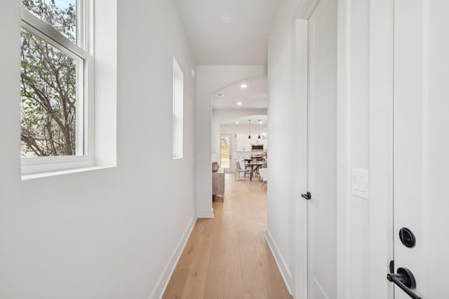 hallway featuring light wood-type flooring