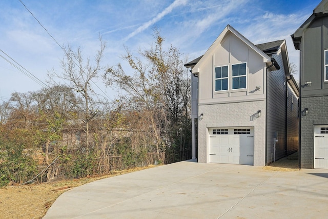 view of property exterior with a garage