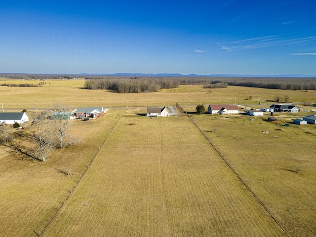 birds eye view of property featuring a rural view