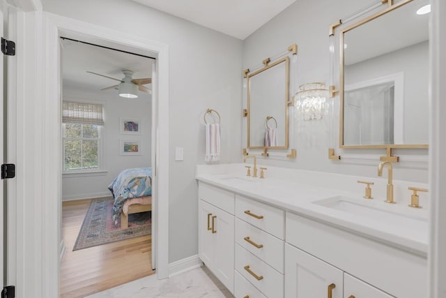 bathroom featuring vanity and ceiling fan