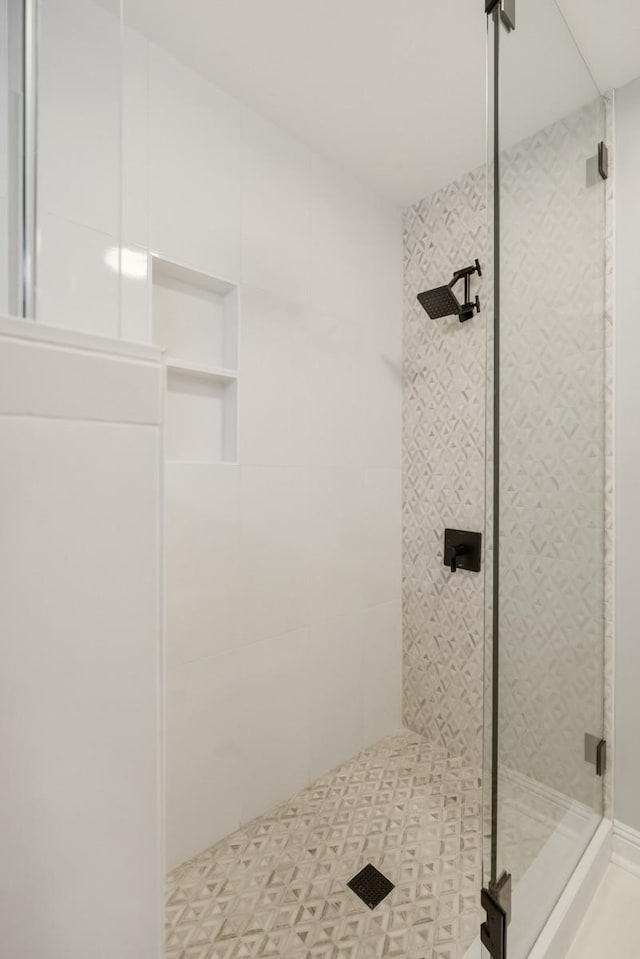 bathroom featuring walk in shower