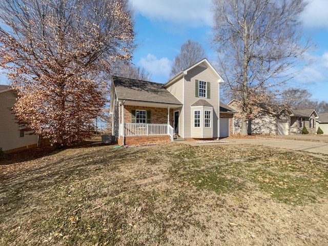 view of front property featuring covered porch and a front lawn