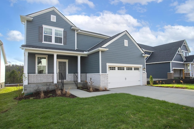 view of front facade featuring a porch, a garage, and a front lawn