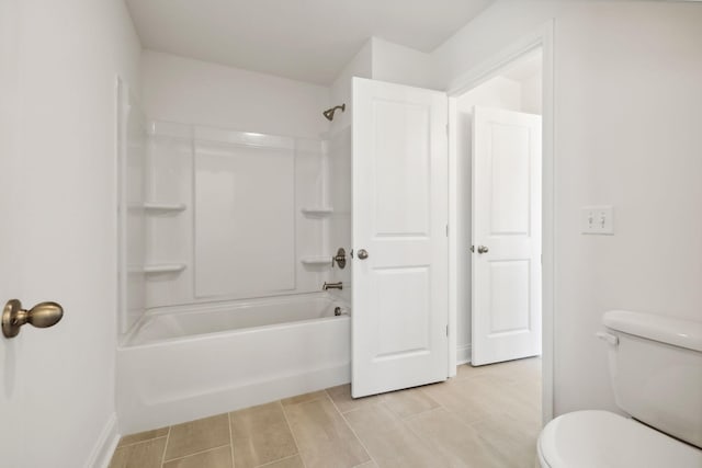 bathroom featuring  shower combination and toilet