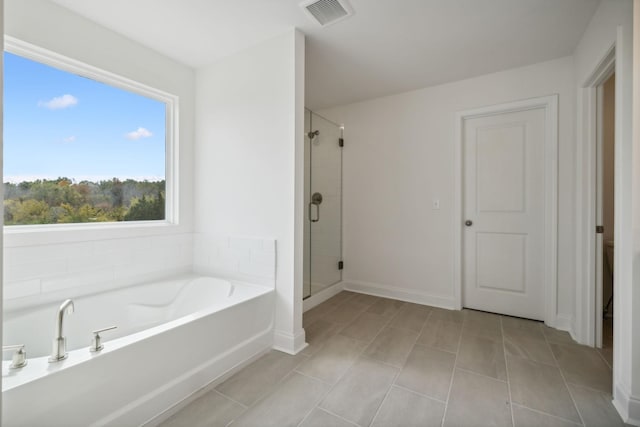 bathroom featuring plus walk in shower