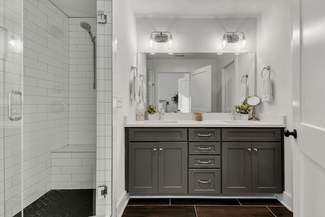 bathroom with vanity and an enclosed shower