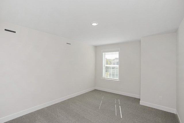 empty room featuring carpet flooring