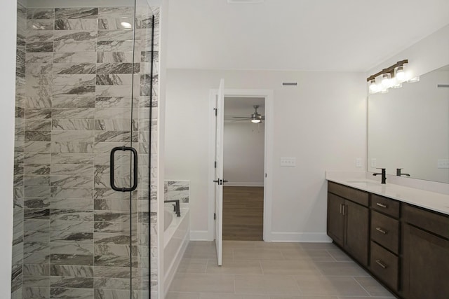 bathroom with vanity, independent shower and bath, and ceiling fan