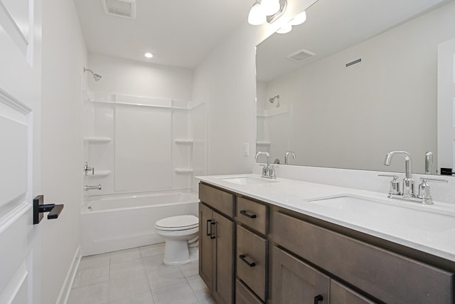 full bathroom featuring bathing tub / shower combination, vanity, tile patterned floors, and toilet