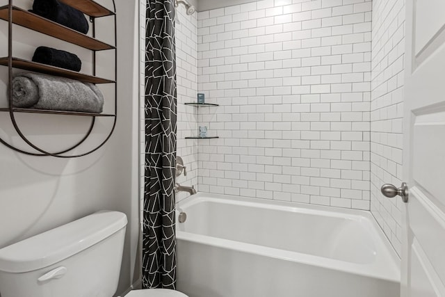 bathroom featuring shower / bathtub combination with curtain and toilet