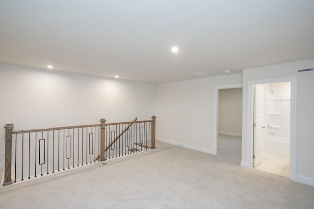 basement with light carpet