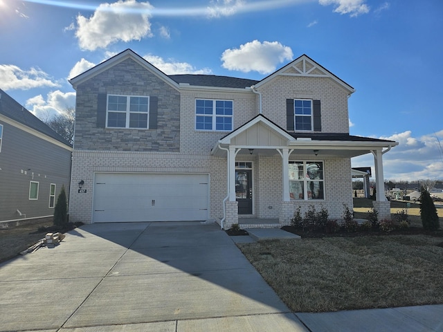 view of front of home featuring a garage and covered porch