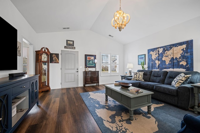 living room with lofted ceiling, a notable chandelier, and dark hardwood / wood-style floors