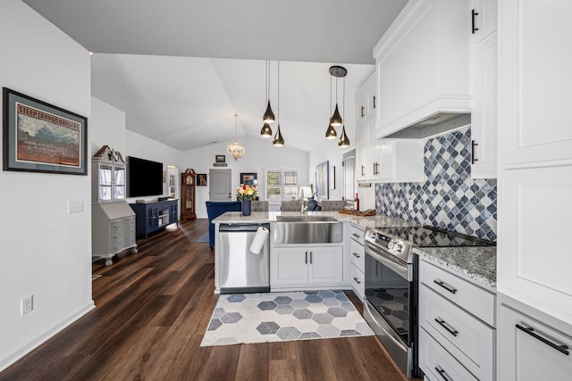 kitchen featuring sink, appliances with stainless steel finishes, hanging light fixtures, white cabinets, and kitchen peninsula