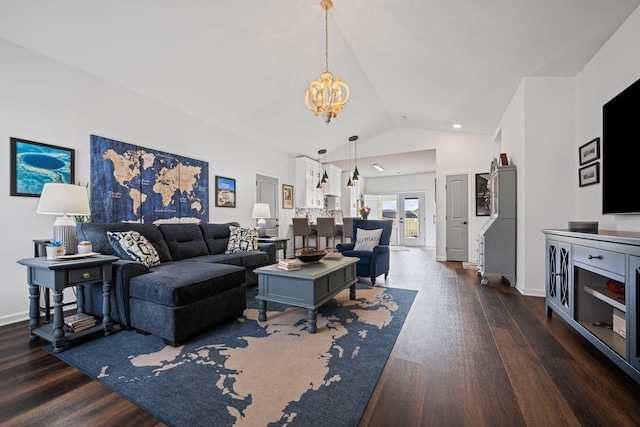 living room with high vaulted ceiling, dark hardwood / wood-style floors, an inviting chandelier, and french doors