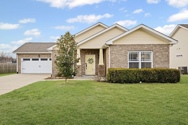 craftsman-style home with a garage, central AC unit, and a front yard