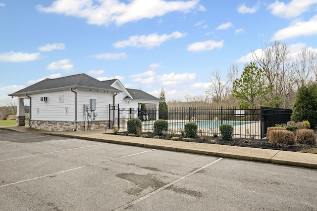 exterior space featuring a covered pool