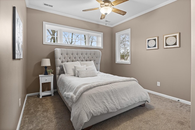 carpeted bedroom featuring ornamental molding and ceiling fan