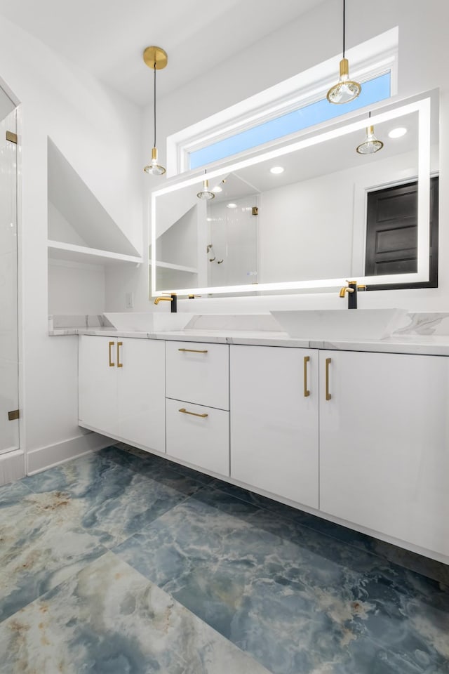 bathroom featuring vanity, an enclosed shower, and concrete floors