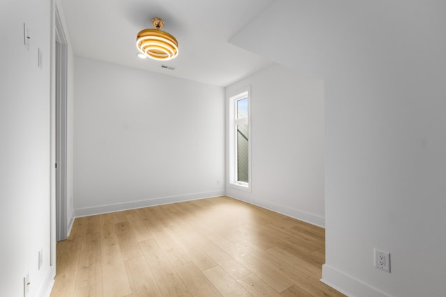 empty room featuring light hardwood / wood-style floors