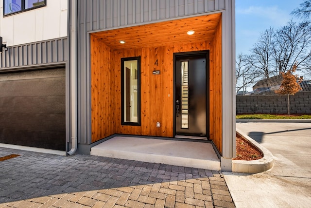 entrance to property featuring a garage