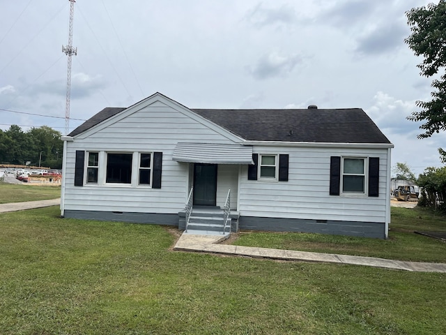 view of front of house with a front yard