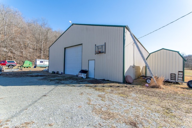 view of outdoor structure featuring a garage