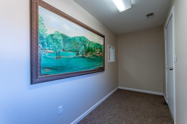 unfurnished room featuring carpet floors