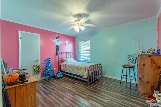 bedroom with ceiling fan, ornamental molding, dark hardwood / wood-style floors, and a textured ceiling