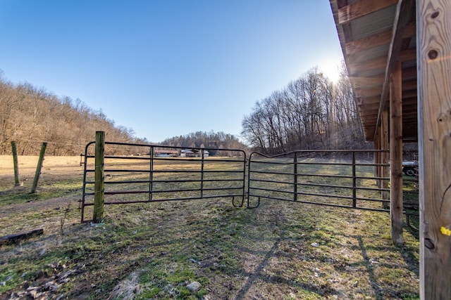 view of gate featuring a rural view