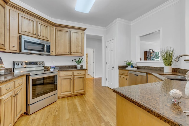 kitchen featuring sink, light hardwood / wood-style flooring, stainless steel appliances, ornamental molding, and light brown cabinetry