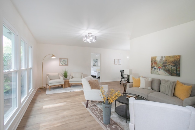 living room with light hardwood / wood-style flooring