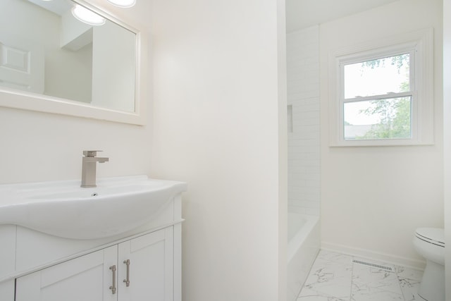 full bathroom with vanity, bathtub / shower combination, and toilet