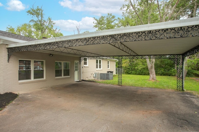 view of patio featuring a carport and central AC unit