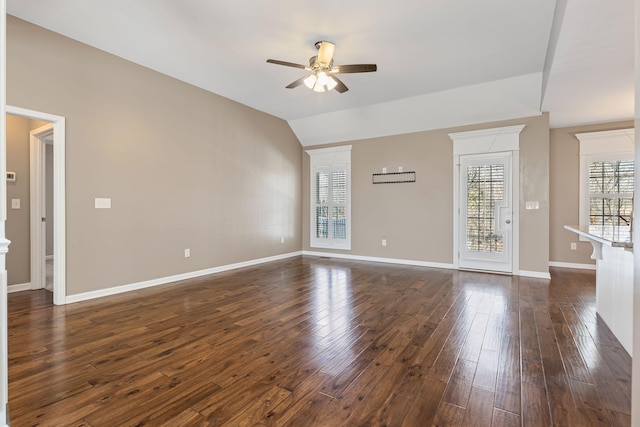 unfurnished living room featuring dark wood-type flooring, ceiling fan, and lofted ceiling