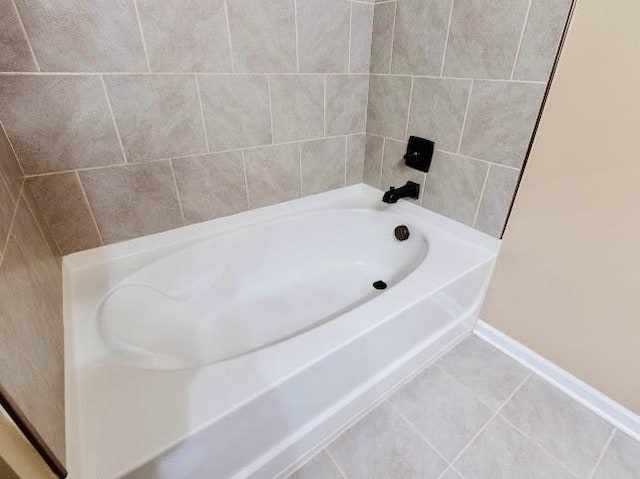 bathroom with tile patterned floors