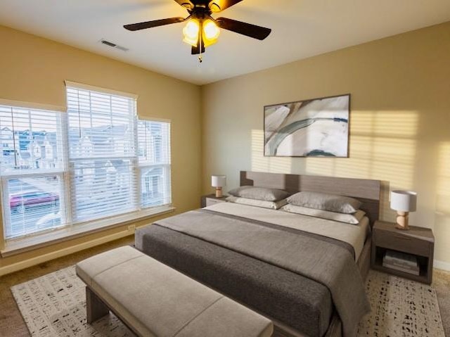 bedroom with carpet floors and ceiling fan