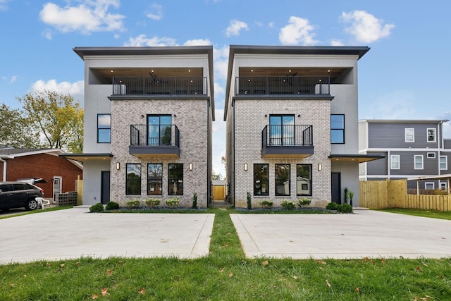 back of property with a balcony