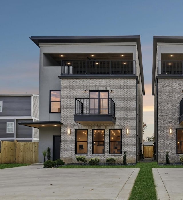 contemporary house with a balcony