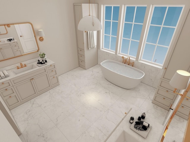 bathroom with vanity and a bath