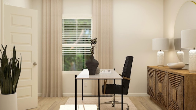 home office with light hardwood / wood-style flooring