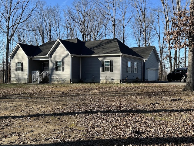 view of front of home featuring a garage